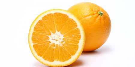 Whole and half orange